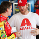 Dale Jr. chats with fill-in driver Jeff Gordon. Photo credit: Getty Images